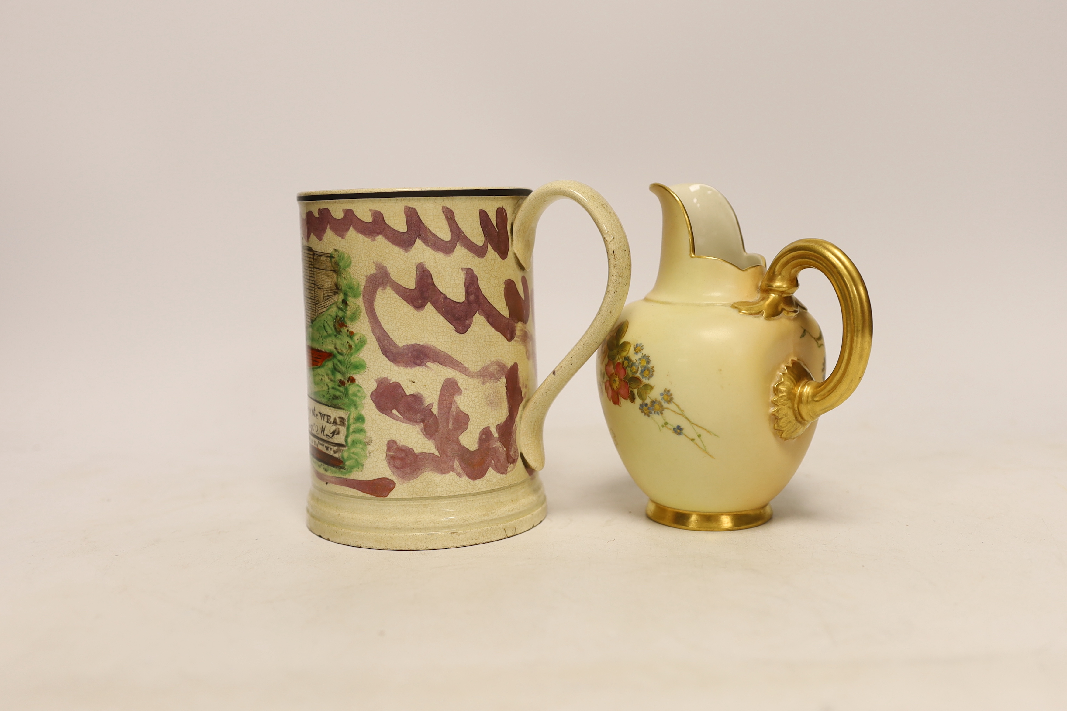 A Sunderland pink lustre pottery frog mug and a Royal Worcester jug, largest 13cm high (2)